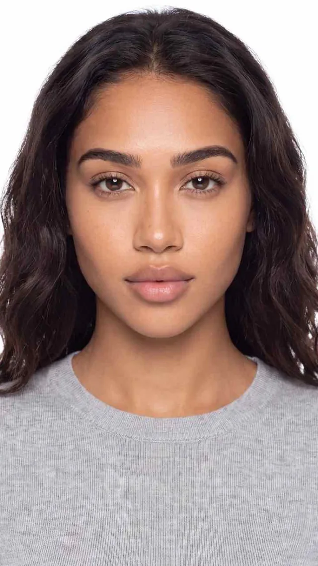 Studio portrait of one consistent AI character